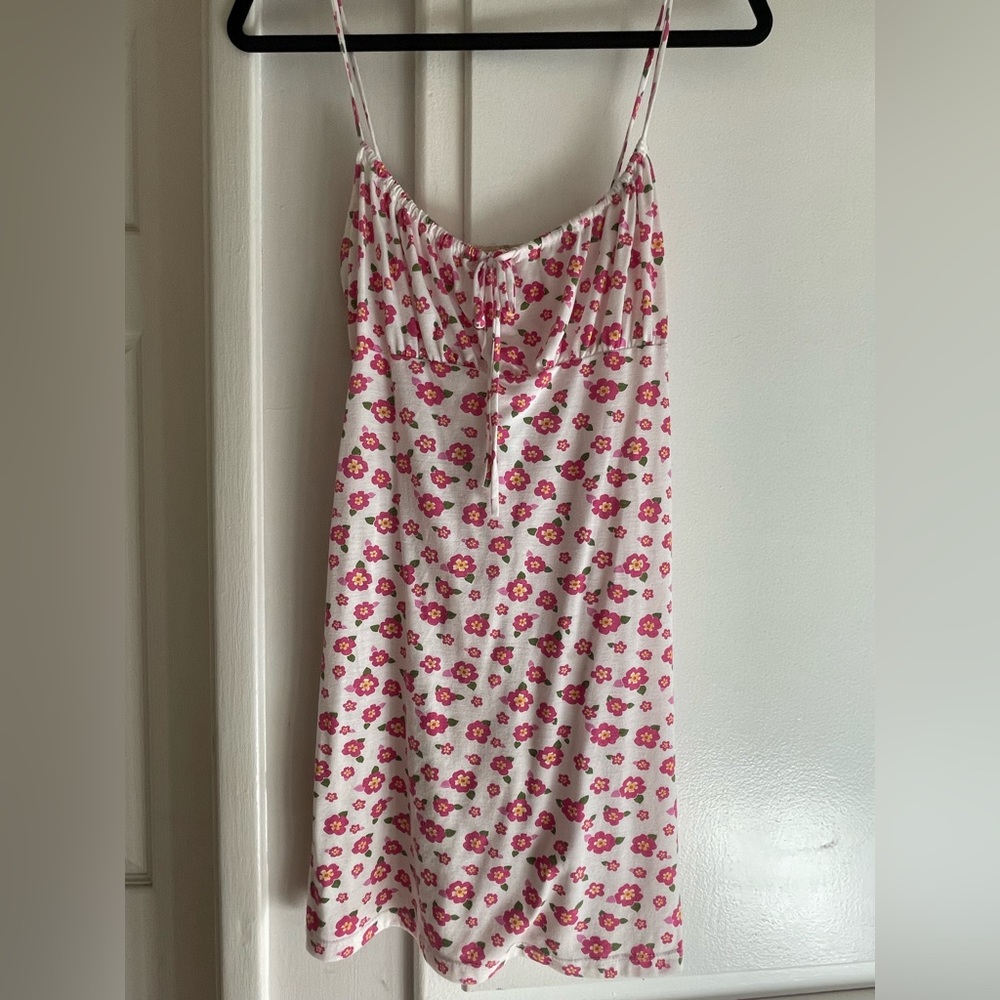 White spaghetti strap dress with tropical pink floral print